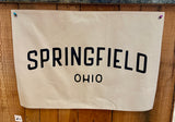 Springfield, Ohio Canvas Banner. Measures 27” x 18”. Choose Natural, or Black.